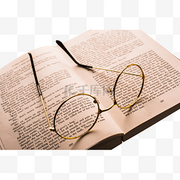 英文书籍素材图片_英文书上的眼镜框