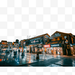 热闹城市图片_冬天夜空下的小镇生活夜景商场