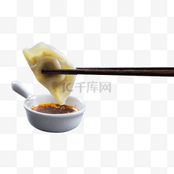筷子夹水饺图片_冬季冬天新年筷子夹饺子