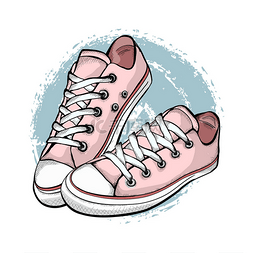 一双粉红色的运动鞋被隔离在白色