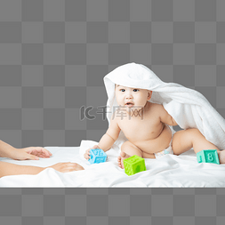 床上一堆衣服图片_披着被子玩耍的男婴床上玩玩具