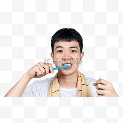 拿着牙膏刷牙保护牙齿的青年男性