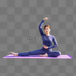 冥想女性图片_年轻运动女性在瑜伽垫上练瑜伽冥
