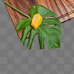 黄色的菠萝蜜素材图片_绿叶上面一块熟透的菠萝蜜
