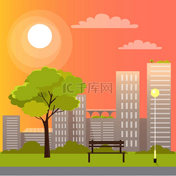 明亮城市图片_在绿树和带圆形灯泡的长路灯与日