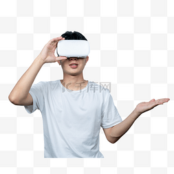 虚拟现实游戏图片_青年男性科技感手扶vr眼镜