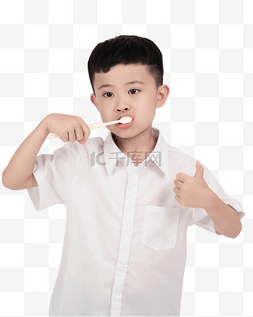男孩手拿牙刷刷牙点赞