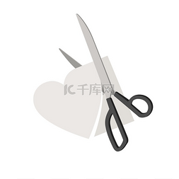 白色折纸心图片_用剪刀从纸上剪出一颗心。