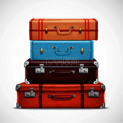 假期旅行行李箱图片_经典的皮革复古旅行行李箱堆着棕