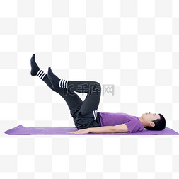 在瑜伽垫上躺着健身练习的年轻男