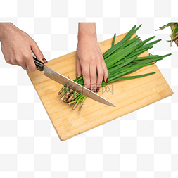割蔬菜图片_案板切绿色韭菜