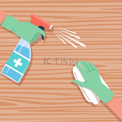 清洁和消毒图片_表面消毒清洁木桌手戴防护手套喷