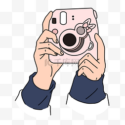 手持图标图片_手持粉色相机的双手