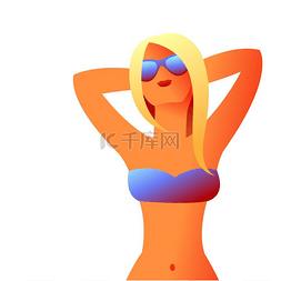 日光浴人图片_在海滩上穿着比基尼的女孩。