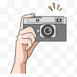 摄影机彩色图片_正在拍照的手持灰色可爱相机