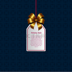 圣诞节装饰优惠券图片_带有闪亮金色蝴蝶结的小标签上的