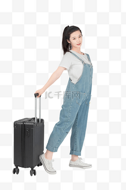 拉行李箱的美女图片_拉行李出行的女孩