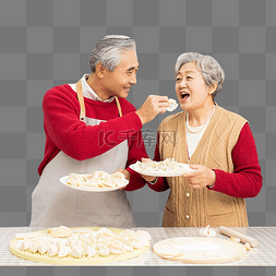 包俗图片_除夕在厨房里包饺子的老年夫妻
