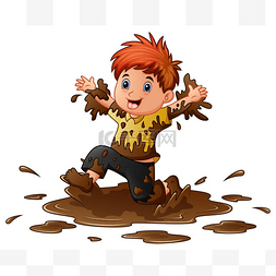 小男孩在泥泞中玩耍