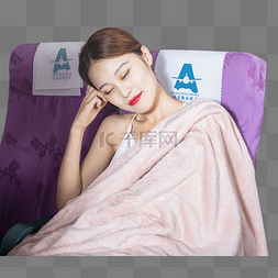 女乘客图片_盖着毛毯的女乘客客舱内睡觉