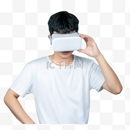 年轻男性VR眼镜科技低头探索