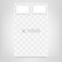 单双人床垫图片_在白色的床垫上窝枕头