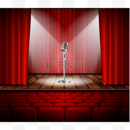聚光灯下的舞台图片_麦克风和红色的窗帘