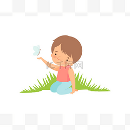 玩的卡通小孩图片_可爱的快乐男孩坐在绿色草地和玩