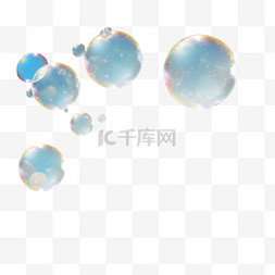蓝色的气泡图案图片_阳光明媚的夏日，肥皂泡在户外翱