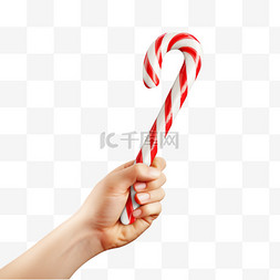 拿着棒棒糖的圣诞老人的手
