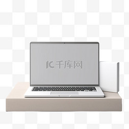 笔记本电脑白色图片_一台放在白色桌子上的笔记本电脑