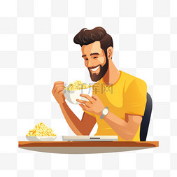 男人看着平板电脑吃爆米花