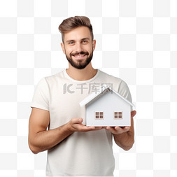 男人手臂上拿着一座房子的模型