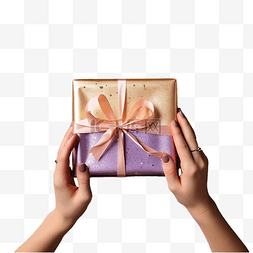 彩装饰系列图片_女手在木质表面包裹圣诞礼物和彩