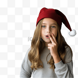 创可贴手指图片_戴着圣诞帽的女孩在没有焦点的墙