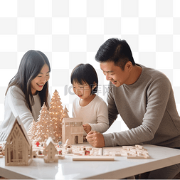 亚洲三口之家一起装饰圣诞树，在