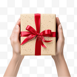 红白礼盒图片_女手握着白木上红丝带包装的圣诞