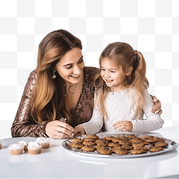 妈妈和小女孩在家吃圣诞饼干