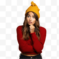 初恋的困惑图片_戴着圣诞帽挂在孤立的黄墙上的女