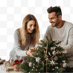 快乐的年轻夫妇喜欢在家装饰圣诞