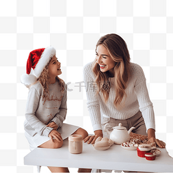 母亲和女儿在家里的圣诞厨房里玩
