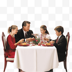 吃貨图片_一家人坐在圣诞餐桌旁互相手牵着