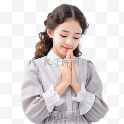 耶稣祈祷图片_亚洲少女在圣诞节庆祝活动中双手