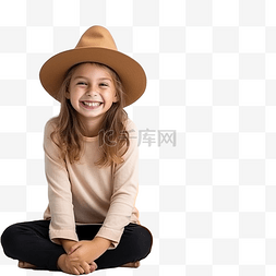 房子旁边图片_微笑的女孩坐在靠近屋门的南瓜旁