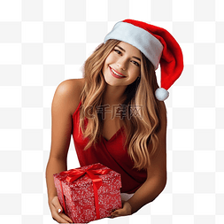 床边图片_戴着红色圣诞帽带礼盒的女孩坐在