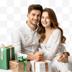 年轻的夫妇图片_年轻快乐的夫妇带着礼物坐在圣诞