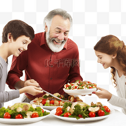 和爸爸用餐图片_快乐的父亲在圣诞家庭晚餐时在盘
