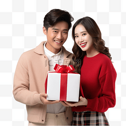 打开圣诞礼盒图片_快乐的亚洲夫妇一起拿着打开的圣