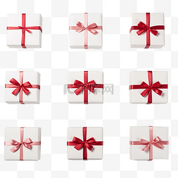 快乐购物快乐有礼图片_一组圣诞白色礼盒，桌上有红丝带