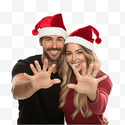 戴着圣诞帽的夫妇在圣诞节自拍，